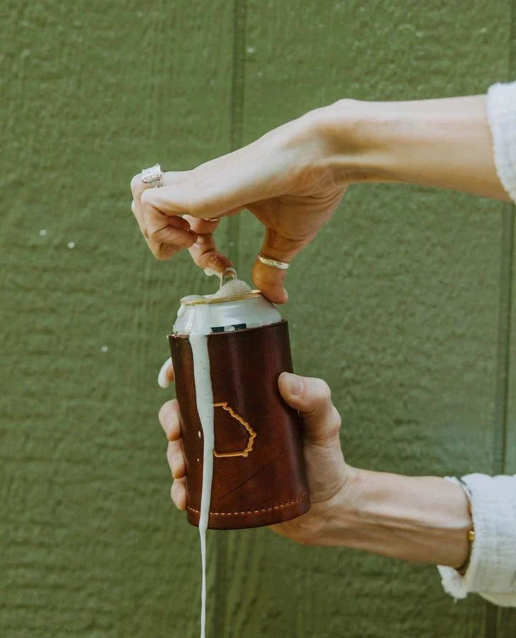 Personalized leather can cooler made from premium handcrafted leather for durable and elegant drinkware cooler